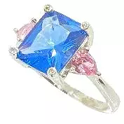 Classic Light Blue Sapphire With Pink Sapphire Side Stones